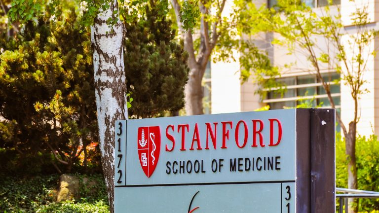 Stanford Medicine demonstrated electrical stimulation of auditory nerve in deaf patients, paving the way for cochlear implants