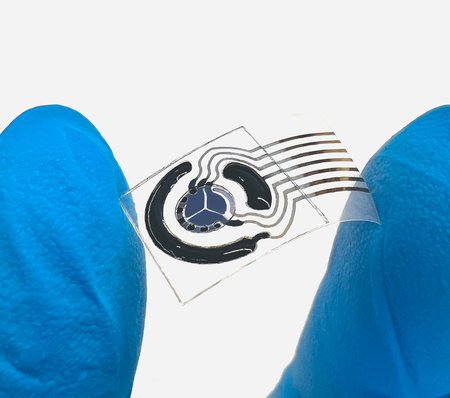 Printable Molecule-Selective Nanoparticles Enable Mass Production of Wearable Biosensors